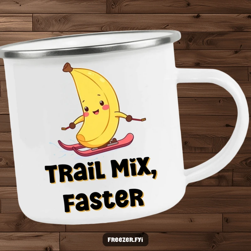 Funny camping mug featuring a giggling banana peel on tiny skis, hilariously zipping down a frosty slope, perfect for outdoor enthusiasts.