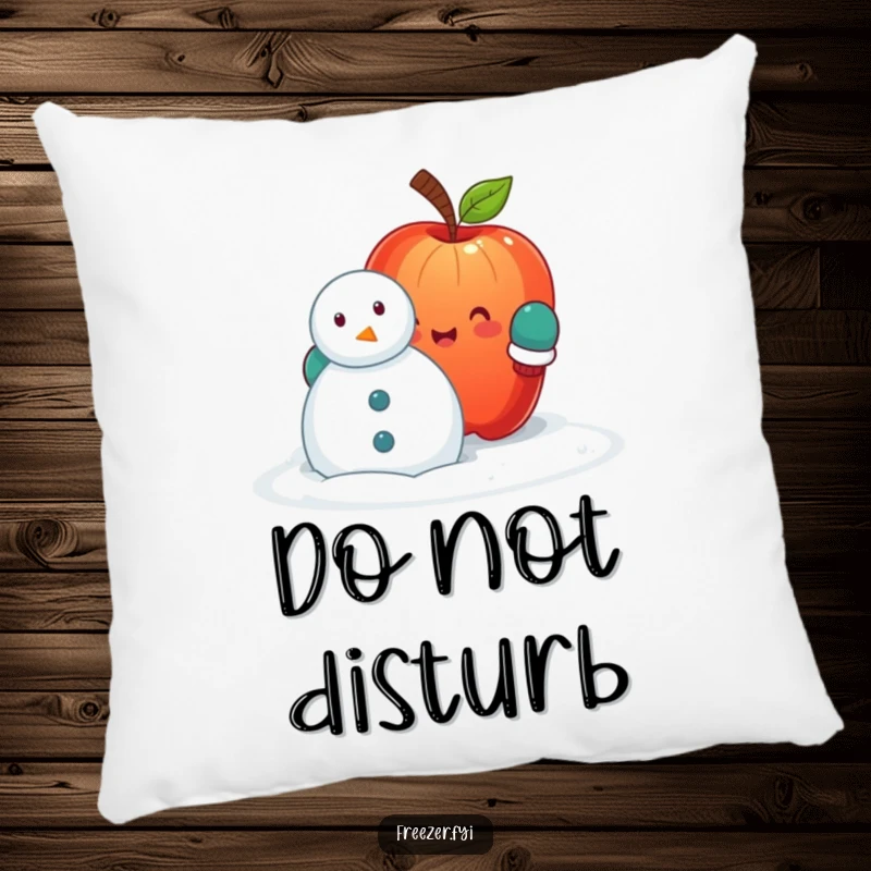 Funny pillow featuring a cheerful apple in mittens, hilariously building a snowman, providing plush comfort and a dose of wintery amusement.