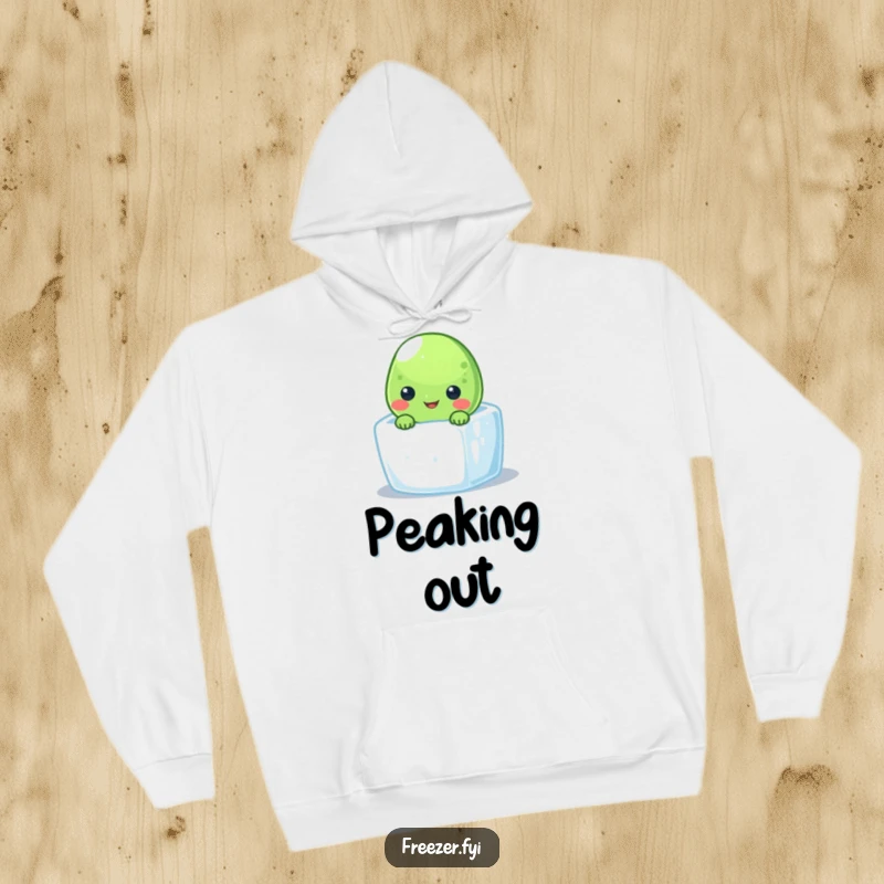 Funny frozen pea hoodie featuring a smiling character peeking from a tiny ice cube, perfect for cozy, cool vibes.