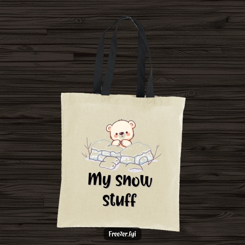 Funny Tote Bag: A cute tote bag featuring a small bear cub enthusiastically building a snow fort, perfect for carrying everyday items with humor.